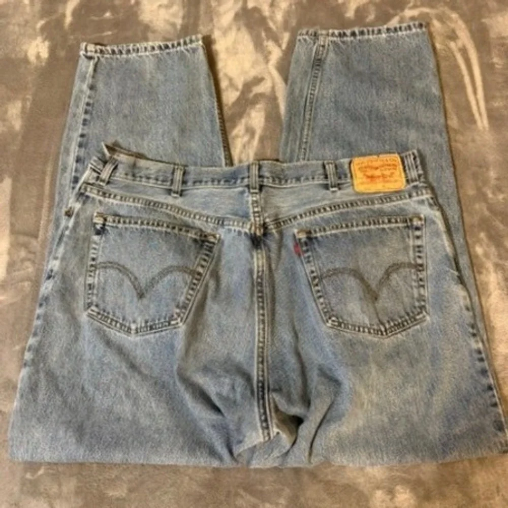 Vintage Levi's 560 Jeans Mens 42x32 Light Wash Comfort Fit Tapered Leg Denim